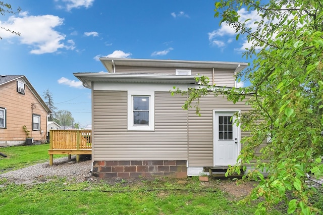 44 W 4th St, Fredericktown, OH 43019 - back of house with a wooden deck and central AC unit