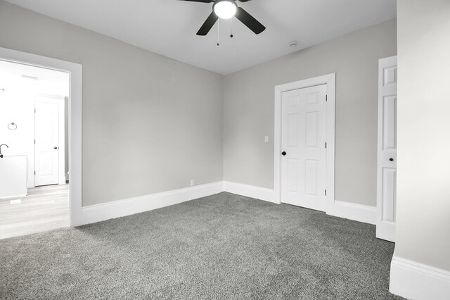 44 W 4th St, Fredericktown, OH 43019 - carpeted spare room with a ceiling fan, baseboards, and a smoke detector