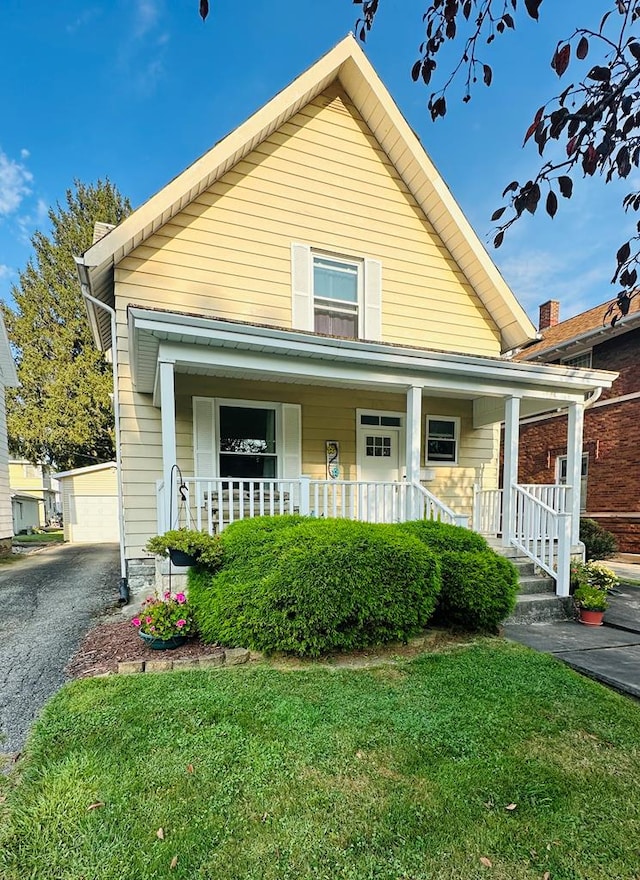 bungalow-style house with an outbuilding