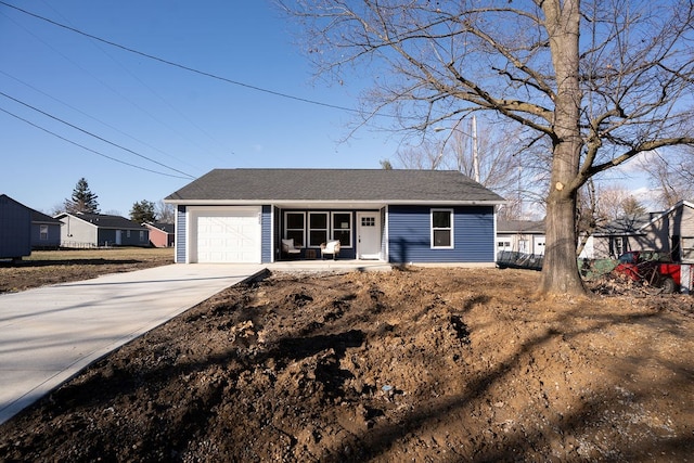 view of front of house with a garage and driveway