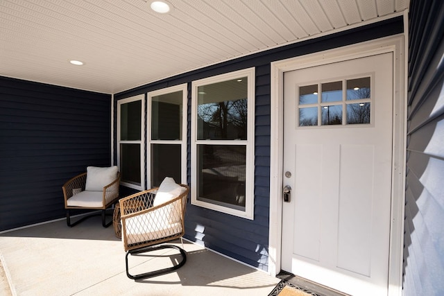 doorway to property featuring a porch