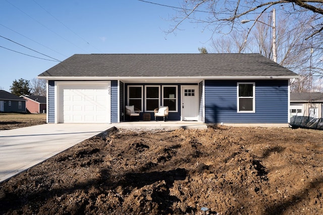 ranch-style home featuring driveway, a porch, roof with shingles, and an attached garage