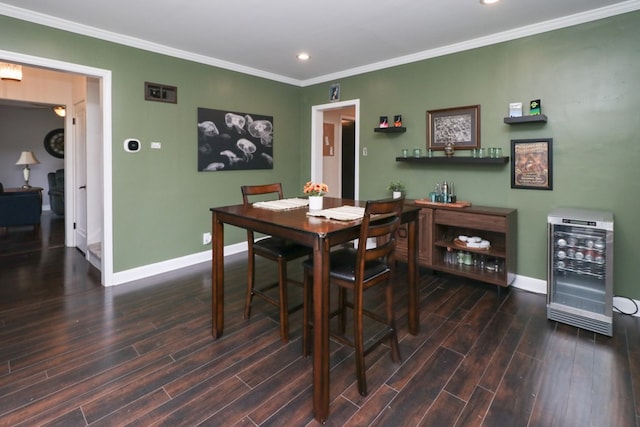 431 Overlook Rd, Mansfield, OH 44903 - dining space with beverage cooler, wood finished floors, recessed lighting, and crown molding
