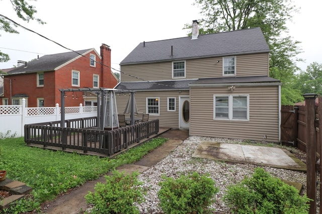 431 Overlook Rd, Mansfield, OH 44903 - rear view of property featuring a pergola, a deck, a fenced backyard, a patio, and a chimney