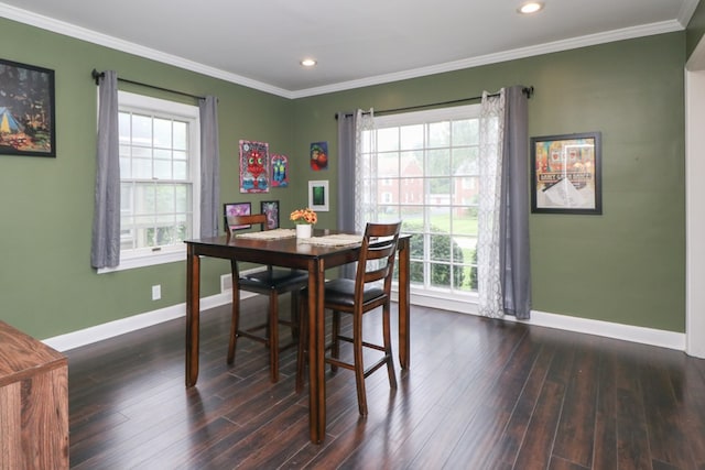 431 Overlook Rd, Mansfield, OH 44903 - dining room featuring healthy amount of natural light, dark wood-type flooring, ornamental molding, and recessed lighting