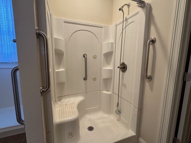 bathroom featuring a shower