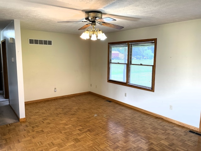 4030 Shoup Rd, Shelby, OH 44875 - empty room featuring ceiling fan, a textured ceiling, and baseboards