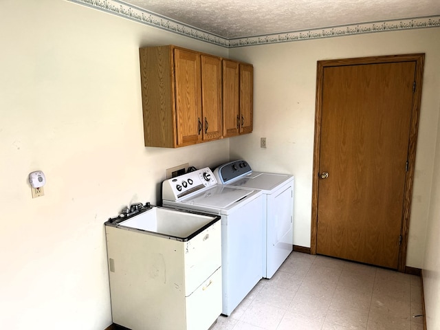 4030 Shoup Rd, Shelby, OH 44875 - laundry area featuring cabinet space and independent washer and dryer