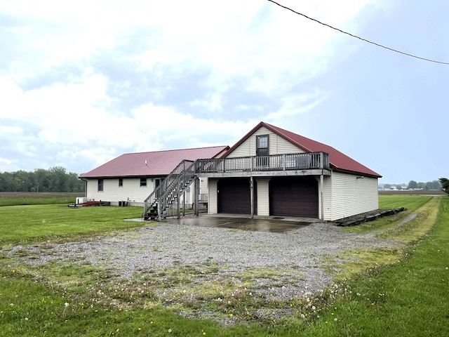 4030 Shoup Rd, Shelby, OH 44875 - garage featuring gravel driveway