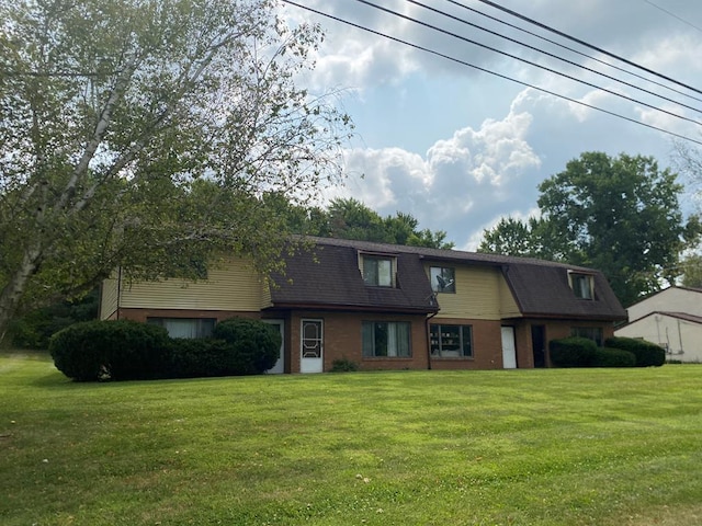 view of front of property with a front yard