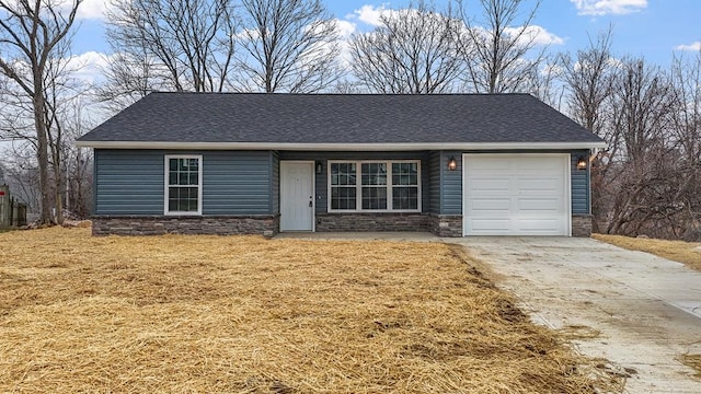 view of front of property featuring a garage