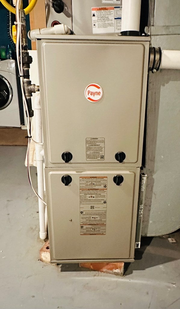 utilities with washer / clothes dryer and heating unit