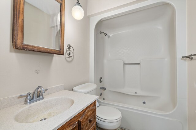 full bath with vanity, shower / bathing tub combination, and toilet