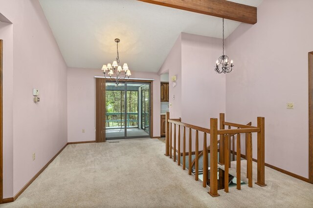dining area with carpet floors, a notable chandelier, and vaulted ceiling with beams