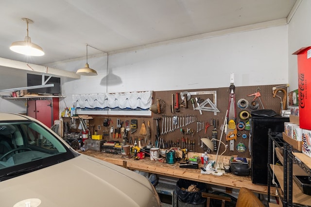 garage with a workshop area