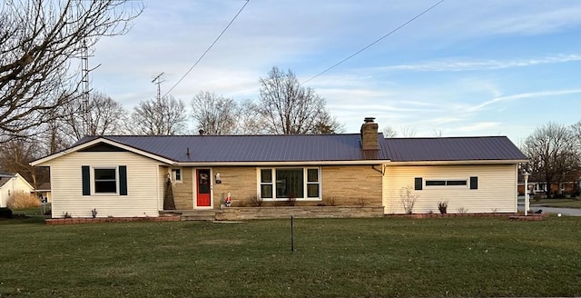 view of front of home with a front yard