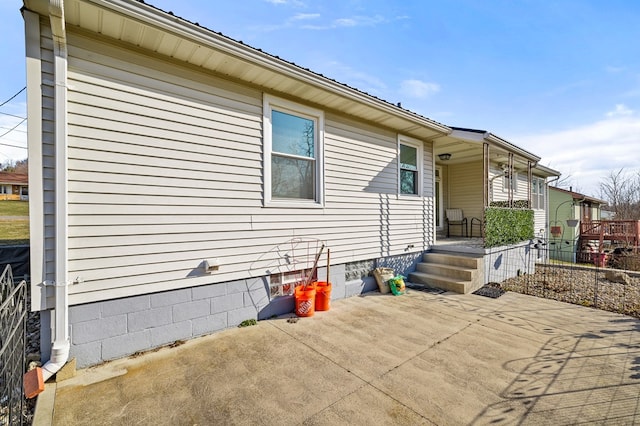 back of property with a patio area