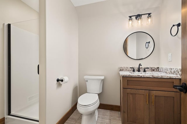 bathroom with tile patterned flooring, vanity, toilet, and an enclosed shower