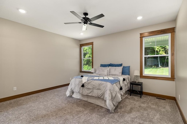 bedroom with carpet floors and ceiling fan