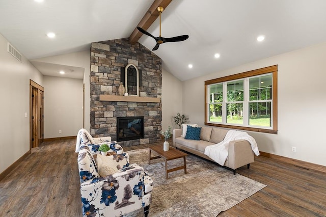 living room with a stone fireplace, ceiling fan, lofted ceiling with beams, and dark hardwood / wood-style floors