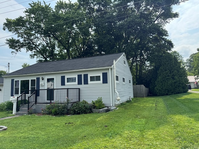 227 S Jefferson St, Loudonville, OH 44842 - view of front of house with a front lawn