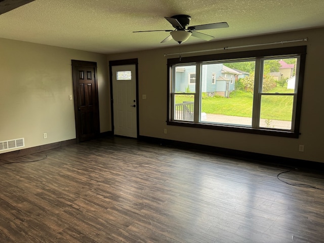 227 S Jefferson St, Loudonville, OH 44842 - entryway with wood finished floors, a textured ceiling, and ceiling fan