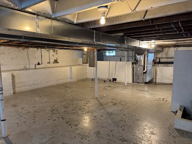 227 S Jefferson St, Loudonville, OH 44842 - unfinished below grade area with electric panel and heating unit