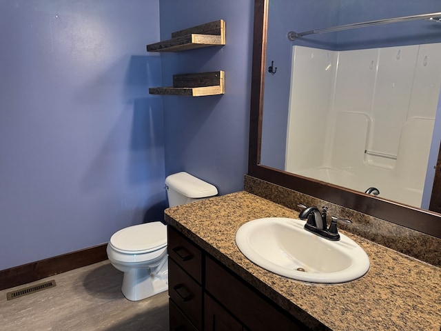 227 S Jefferson St, Loudonville, OH 44842 - full bath with vanity, a shower, and wood finished floors