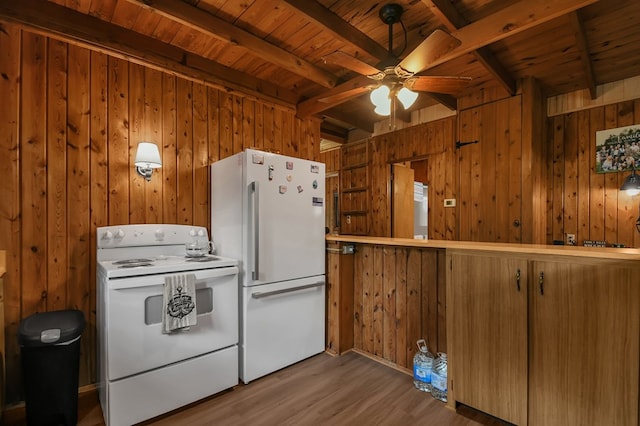 58 Edgewood Dr, Perrysville, OH 44864 - kitchen featuring white appliances, wood walls, a ceiling fan, wood finished floors, and wooden ceiling with exposed beams