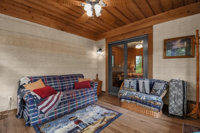 58 Edgewood Dr, Perrysville, OH 44864 - sitting room with ceiling fan, wood walls, wood ceiling, and wood finished floors