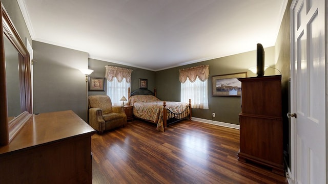 bedroom with dark wood-style flooring, ornamental molding, and baseboards