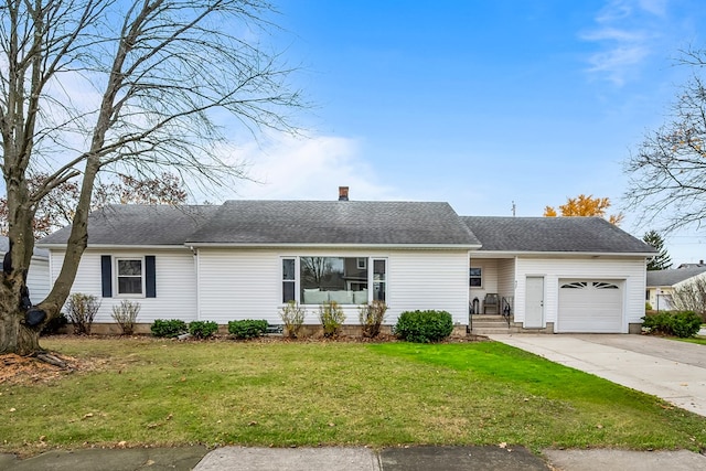 ranch-style house with a front lawn and a garage