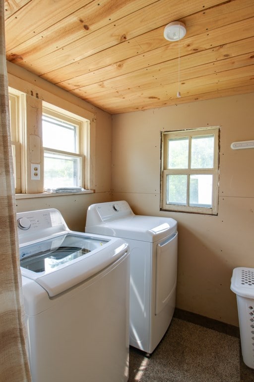 821 Charles St, Galion, OH 44833 - laundry room featuring washing machine and dryer, plenty of natural light, and wooden ceiling