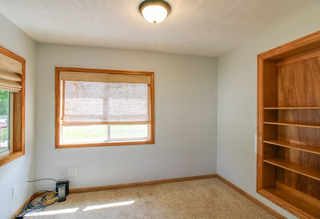 821 Charles St, Galion, OH 44833 - spare room with light carpet and baseboards