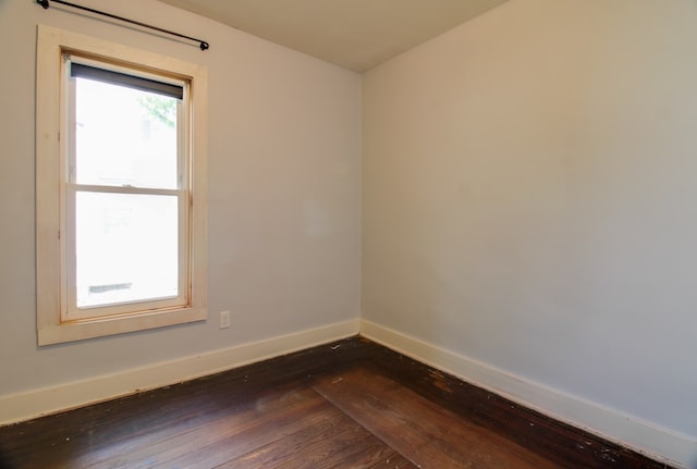821 Charles St, Galion, OH 44833 - unfurnished room featuring dark wood-type flooring and baseboards