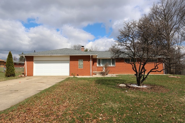 ranch-style house with brick siding, a front yard, driveway, and an attached garage