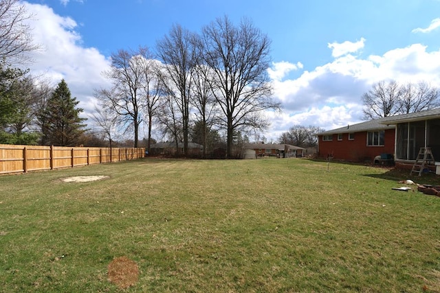 view of yard featuring fence