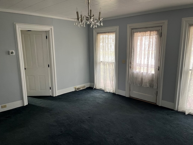 interior space with an inviting chandelier and ornamental molding