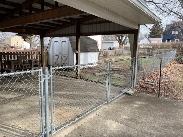 view of gate with a storage unit