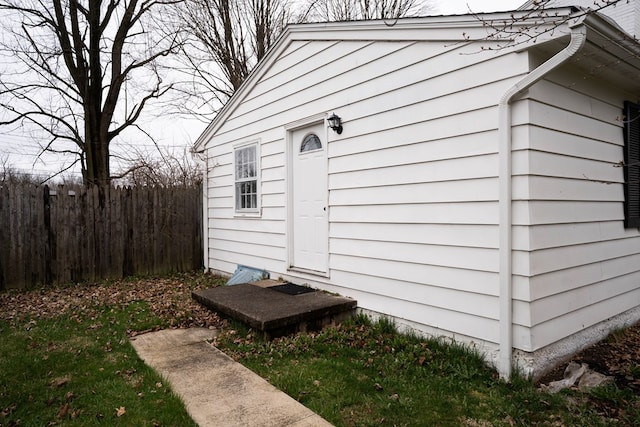 view of side of property featuring fence