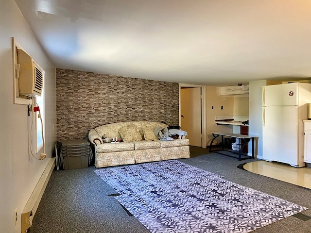 living room with a wall mounted air conditioner and baseboard heating