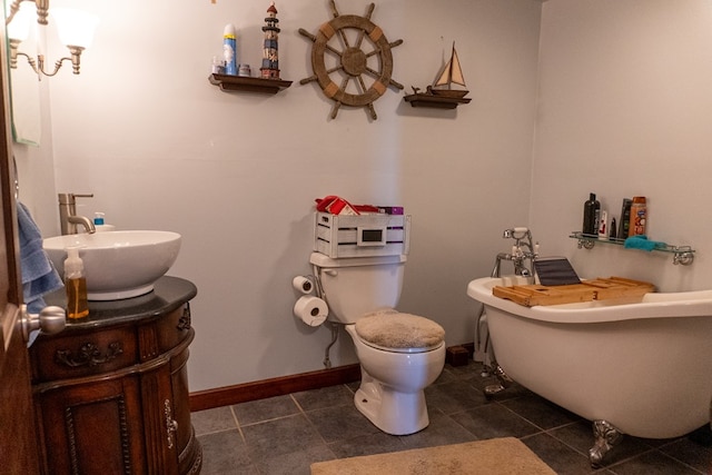 5837 Township Road 103, Mount Gilead, OH 43338 - bathroom featuring vanity, a freestanding tub, and tile patterned flooring