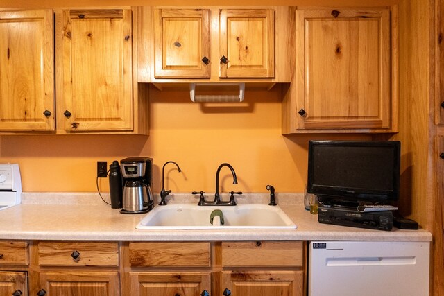 5837 Township Road 103, Mount Gilead, OH 43338 - kitchen featuring white dishwasher and light countertops