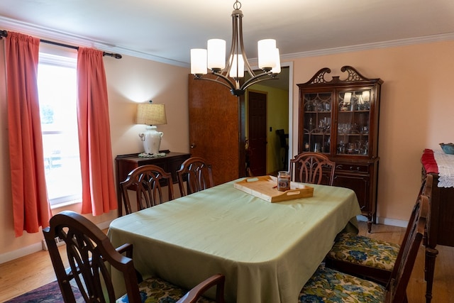 5837 Township Road 103, Mount Gilead, OH 43338 - dining area featuring a chandelier, ornamental molding, and wood finished floors