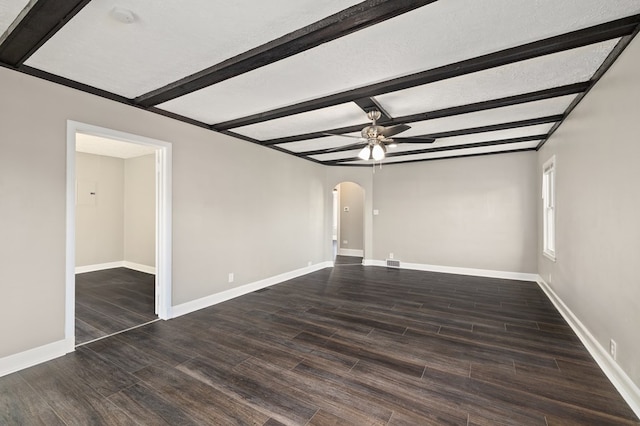 459 Glessner Ave, Mansfield, OH 44903 - spare room with arched walkways, ceiling fan, wood finished floors, and beamed ceiling