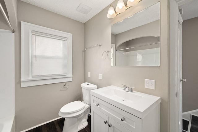 459 Glessner Ave, Mansfield, OH 44903 - full bathroom featuring toilet, wood finished floors, vanity, a shower, and baseboards