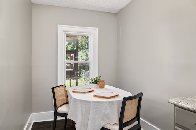 459 Glessner Ave, Mansfield, OH 44903 - dining room featuring baseboards and wood finished floors