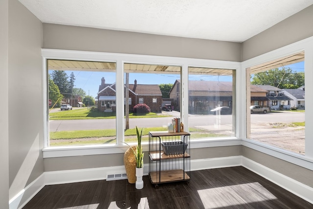 459 Glessner Ave, Mansfield, OH 44903 - living area featuring baseboards, a residential view, and wood finished floors