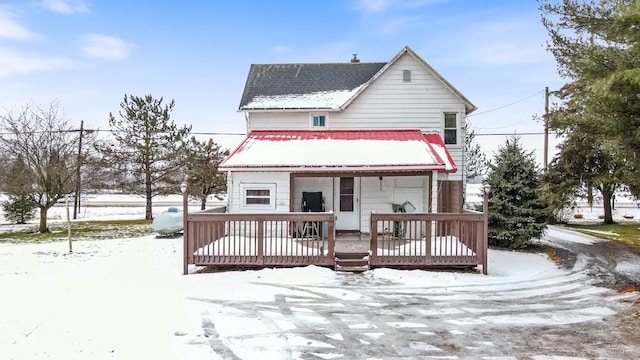 view of front of house with a wooden deck