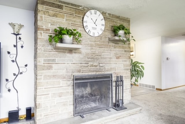 room details with a stone fireplace